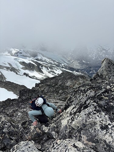 Andrea scrambling up to the summit