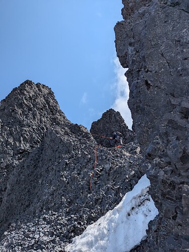 Francis pulling the rope after rapping back off the true summit