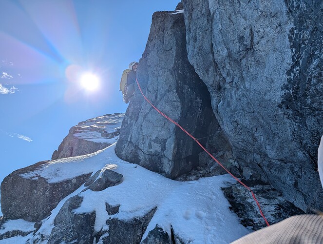 Trev leading a snowy pitch.