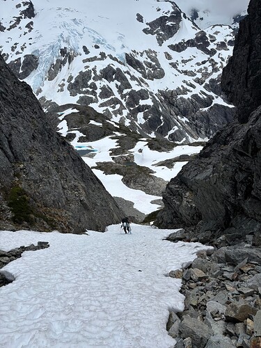 Andrea booting up the prominent couloir to Peak 6600