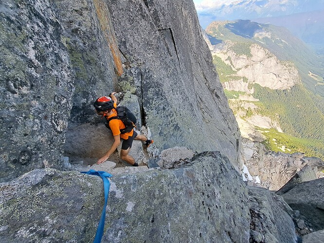 Negotiating an easy but chossy corner near the top of the Northeast Ridge of Rexford. Harder but more solid alternatives exist.