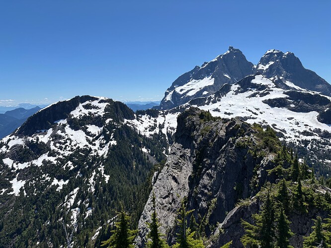 View from first unnamed peak. Other summit of this peak up head in foreground. Second unnamed on L.