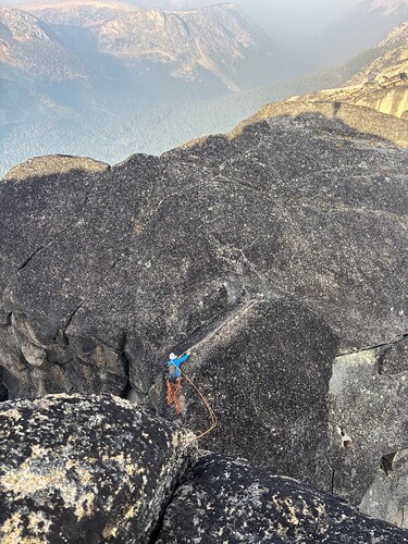 Climbing back out from one of the rappels. Note the wind.